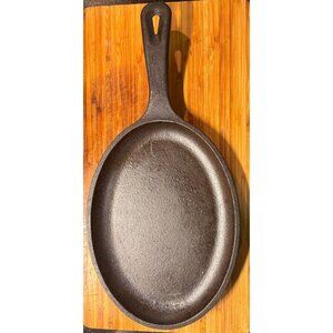 Lodge Cast Iron Oval Serving Griddle With Handle 12 Inch Pre-Seasoned Cookware M